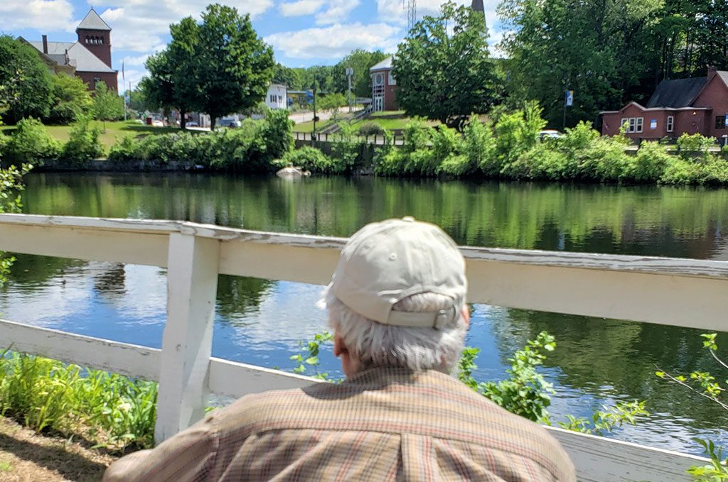 Man overlooking the views from Peabody Place assisted living options in Franklin NH