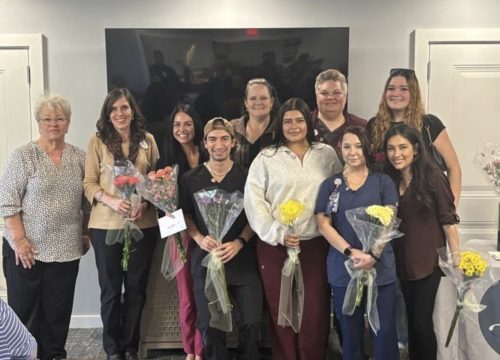 Peabody Place employees gather for a group photo